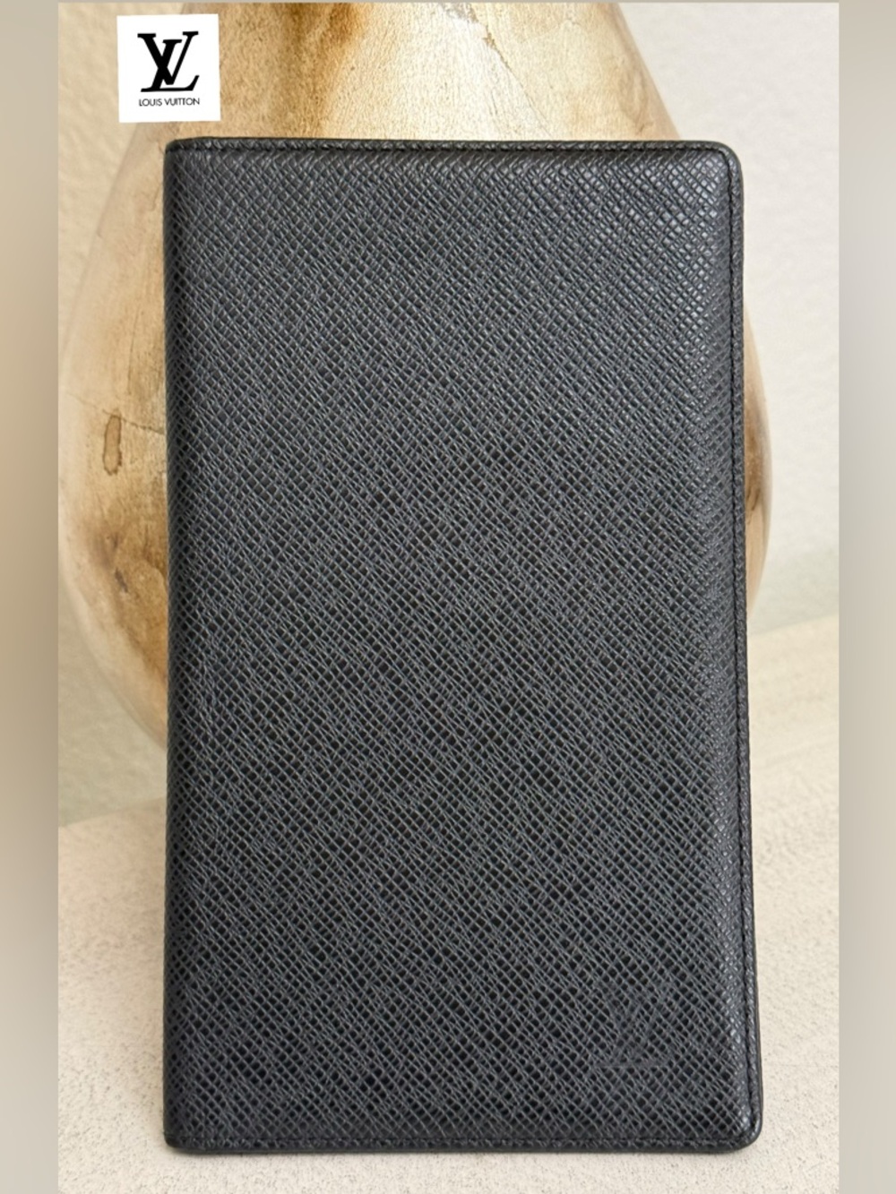 LOUIS VUITTON Taiga Vertical Bifold Wallet